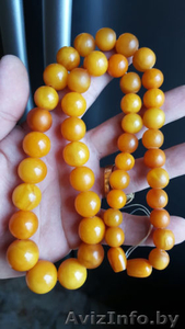 Куплю старые янтарные бусы,  куски янтаря. Дорого